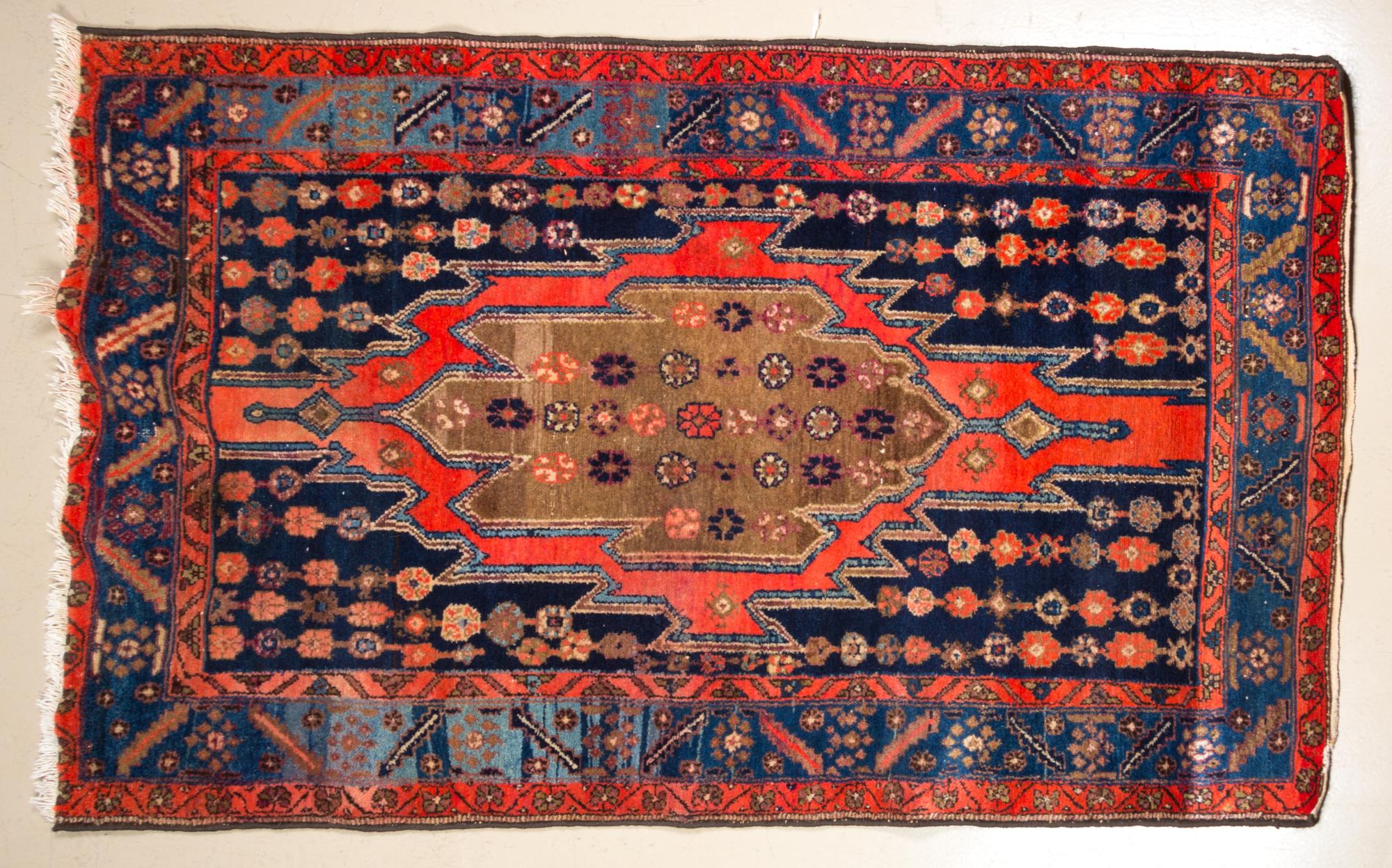 A Northwest Persian Runner 6 feet 2 inches x 4 feet 4 inches.