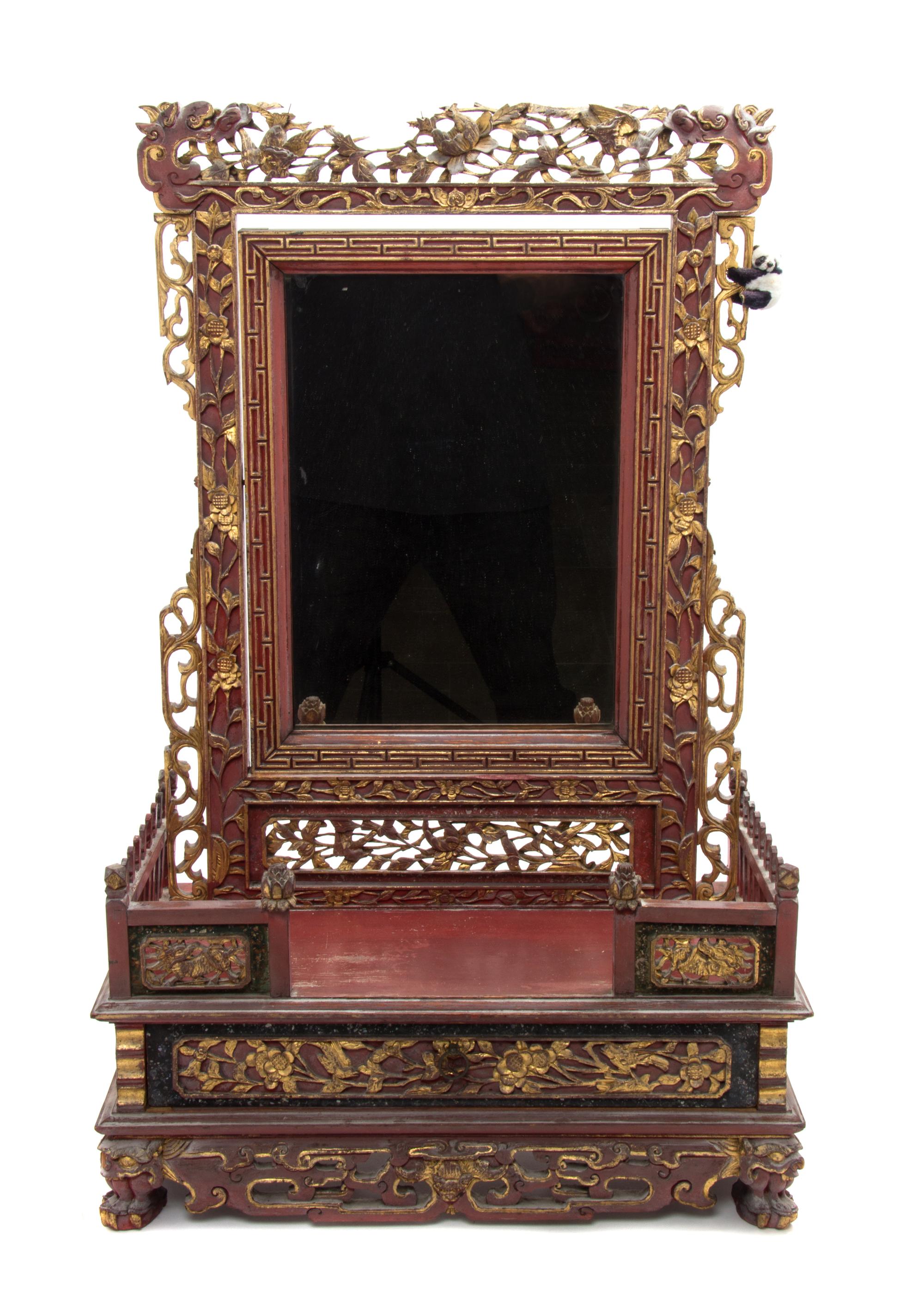 A Chinese Parcel Gilt Red Lacquer Carved Wood Dressing Mirror Height of mirror 31 x width 20 inches. — LATE 19th CENTURY