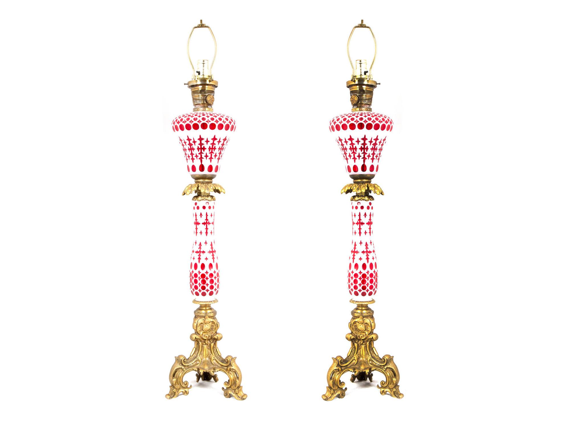 A Pair of White Opaque Cut-to-Cranberry Glass Fluid Lamps by Boston and Sandwich Glass Co., MA
