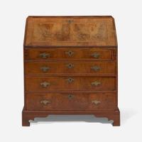 A Queen Anne walnut-banded and pine slant-front desk circa 1740