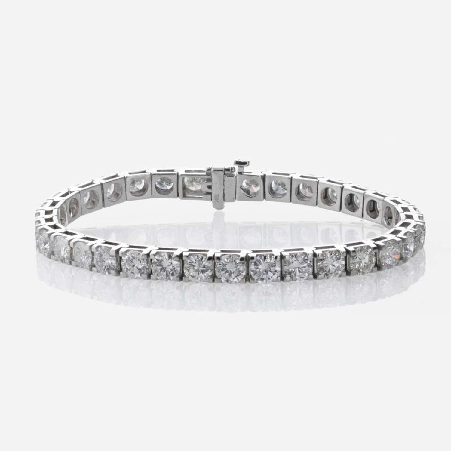 A Diamond and 18K White Gold Tennis Bracelet