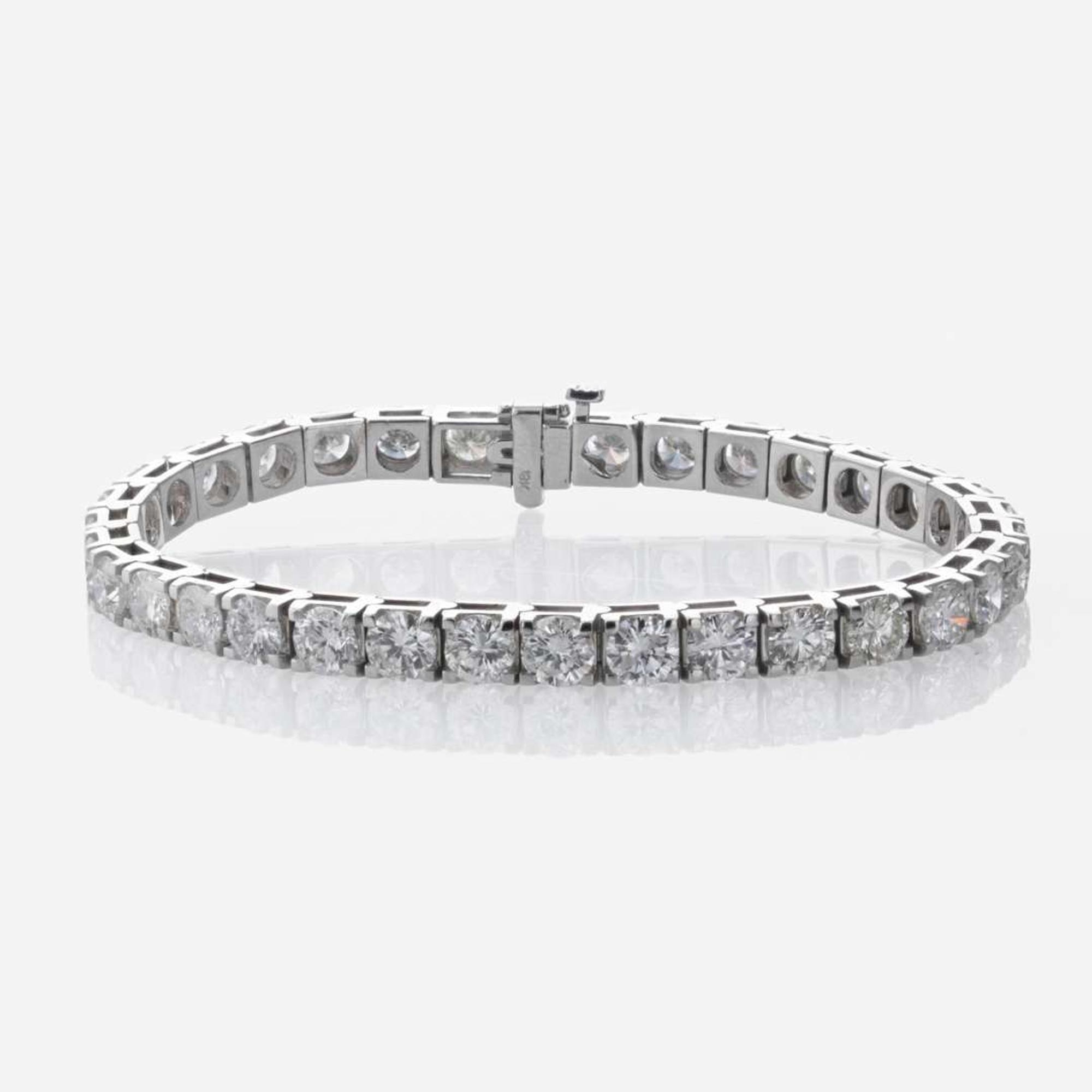 A Diamond and 18K White Gold Tennis Bracelet