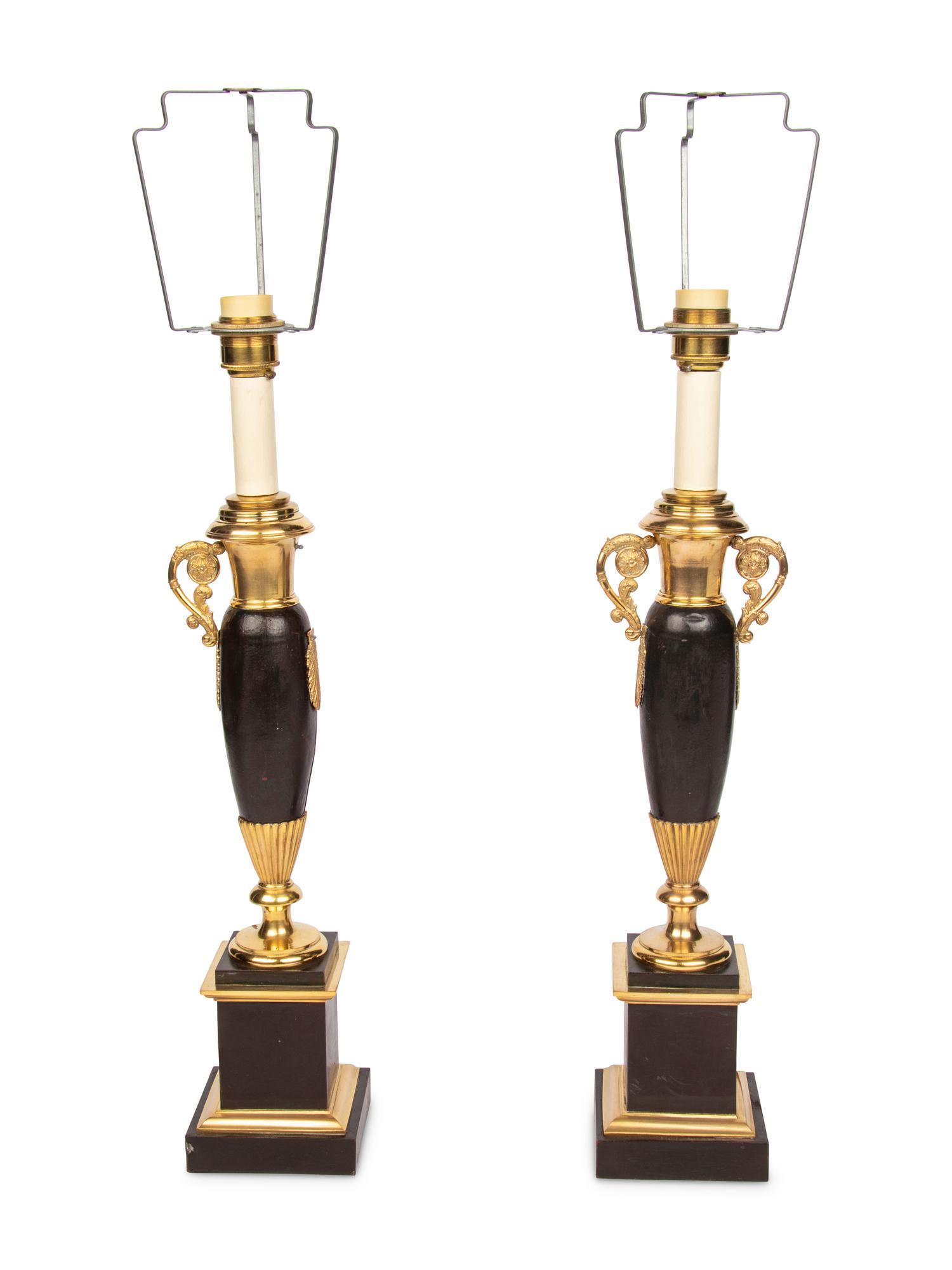 A Pair of Empire Style Painted and Parcel-Gilt Metal Lamps