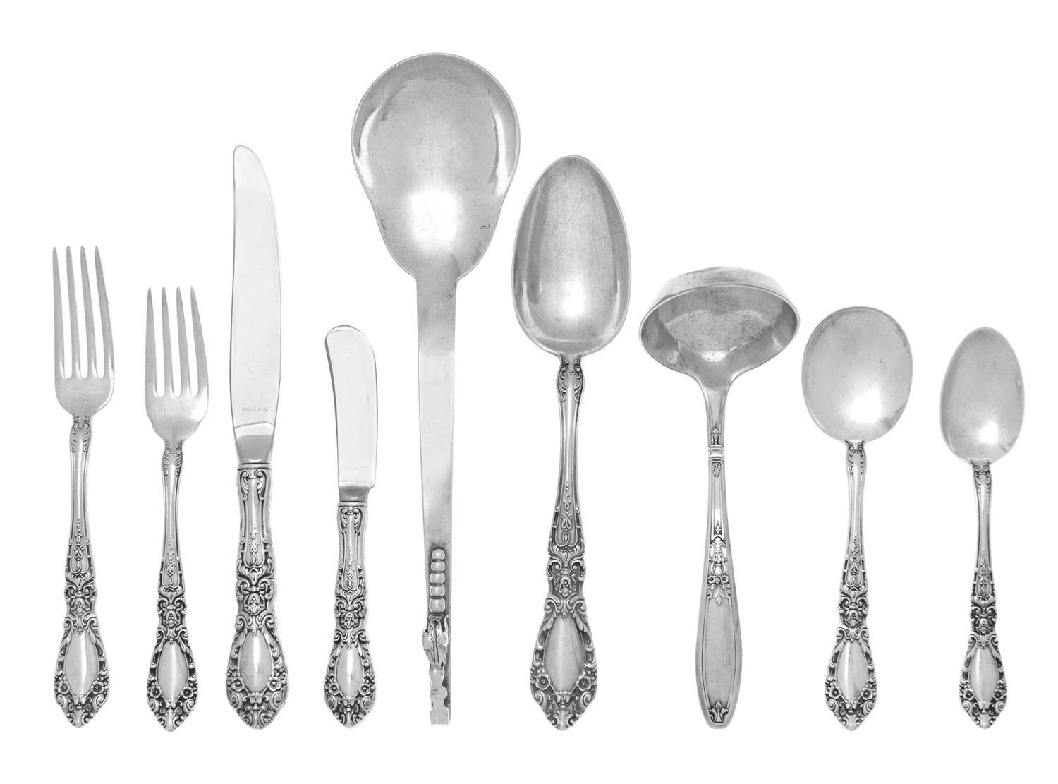 An American Silver Flatware Service, Alvin Manufacturing Co., Providence, RI, Prince Eugene pattern, comprising: 12 dinner knives 12 bu
