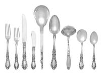An American Silver Flatware Service, Alvin Manufacturing Co., Providence, RI, Prince Eugene pattern, comprising: 12 dinner knives 12 bu