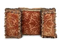 A Set of Three Velvet Upholstered Pillows with Tassels