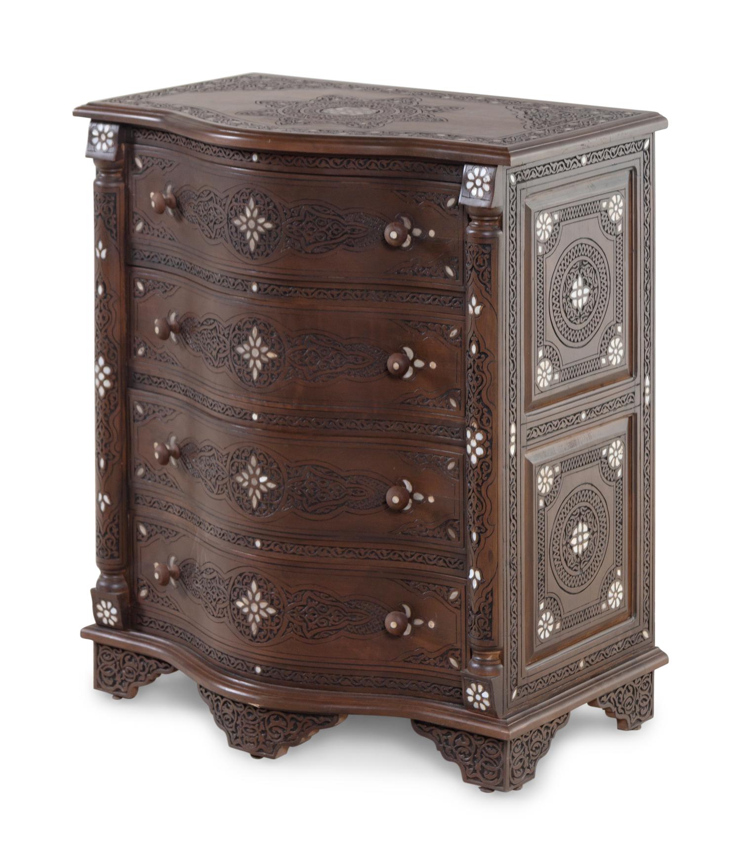 A Syrian Carved Mother-of-Pearl Inlaid Walnut Serpentine Chest of Drawers