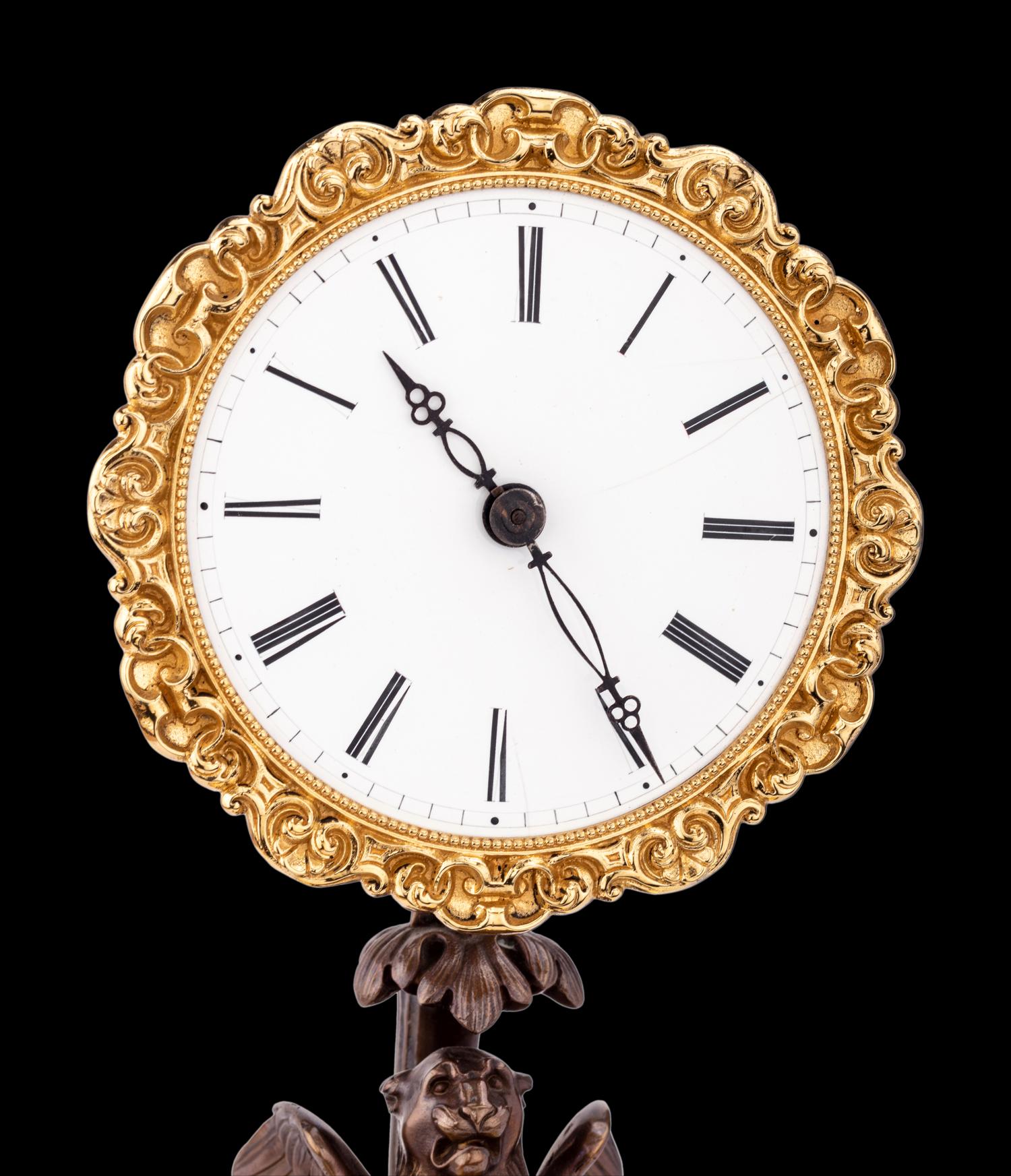 A French Gilt and Patinated Bronze Mystery Clock, with Wood Base, Attributed to Jean Eugene Robert Houdin