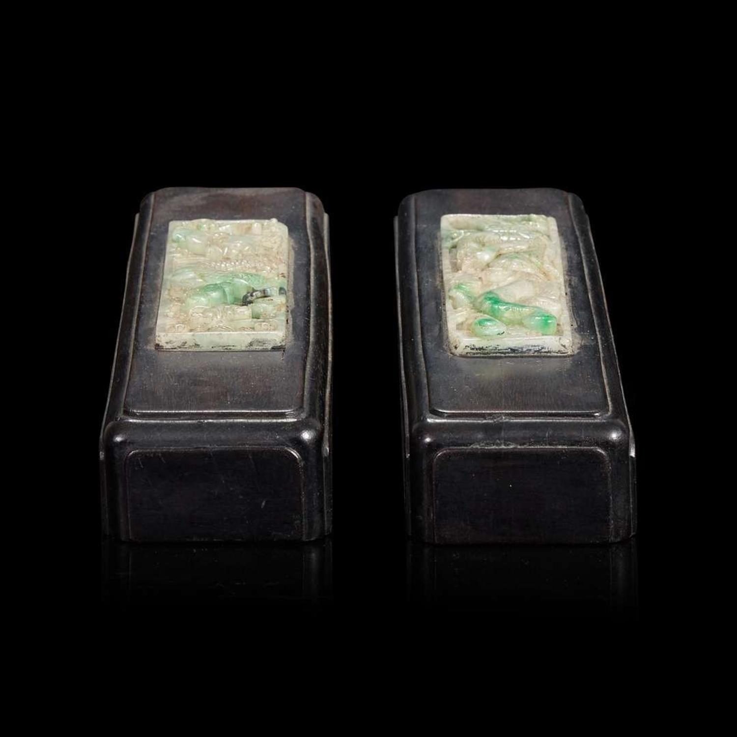 A pair of Chinese jadeite and hardwood scroll weights