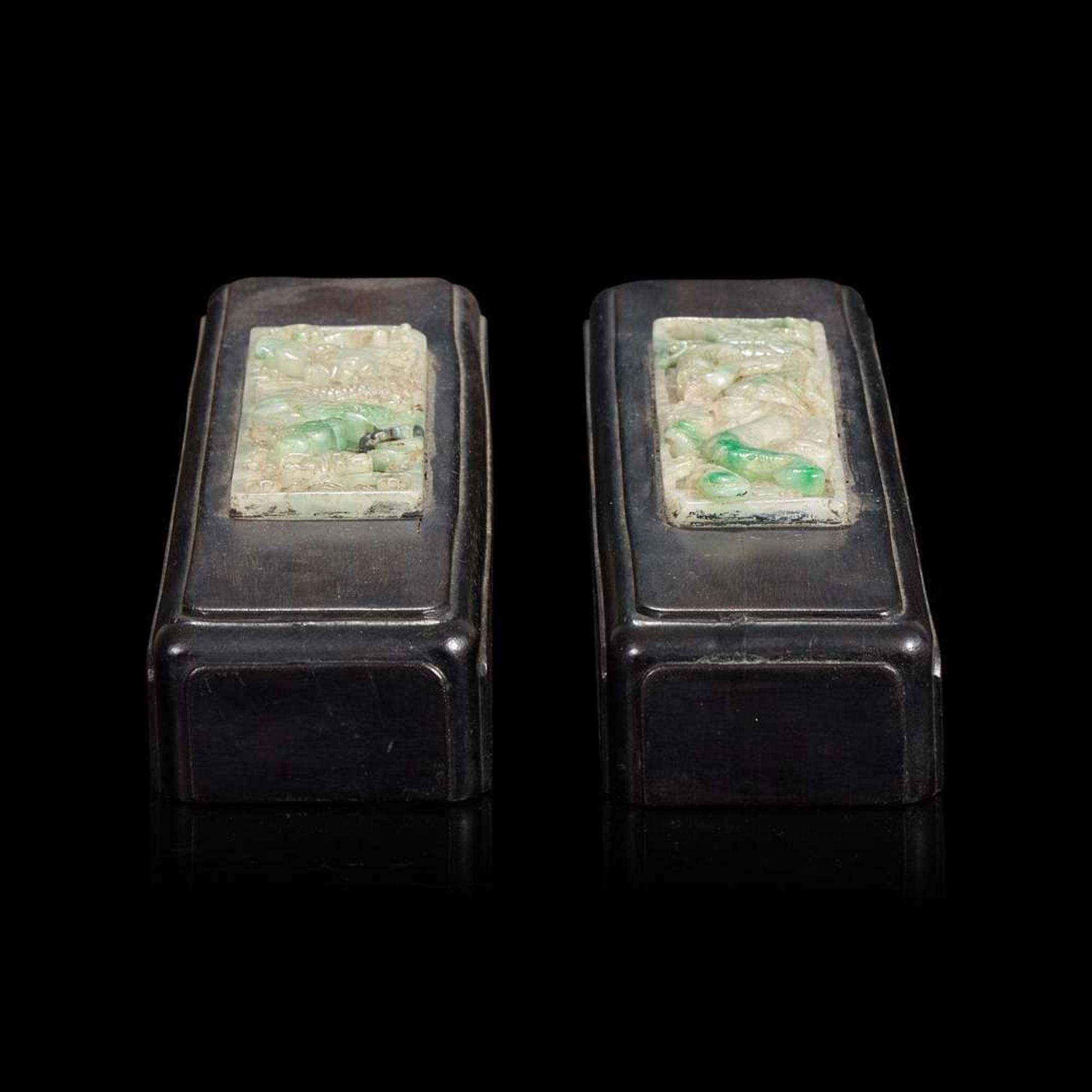 A pair of Chinese jadeite and hardwood scroll weights