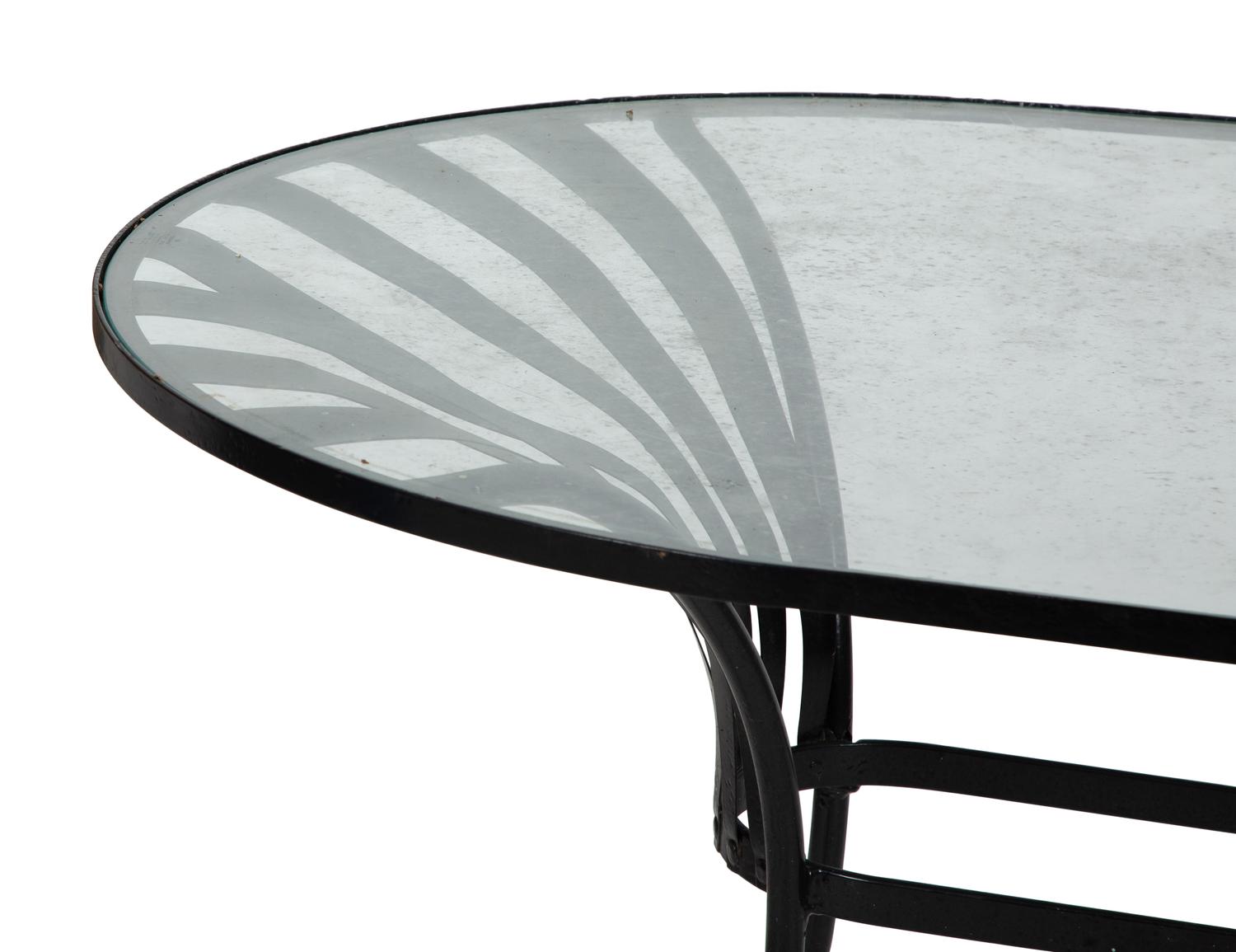 A Spring Steel Garden Table and Eight Chairs by Francois Carre