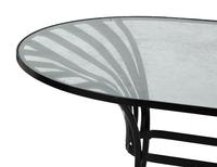 A Spring Steel Garden Table and Eight Chairs by Francois Carre