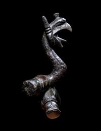 An East Greek Bronze Griffin Protome