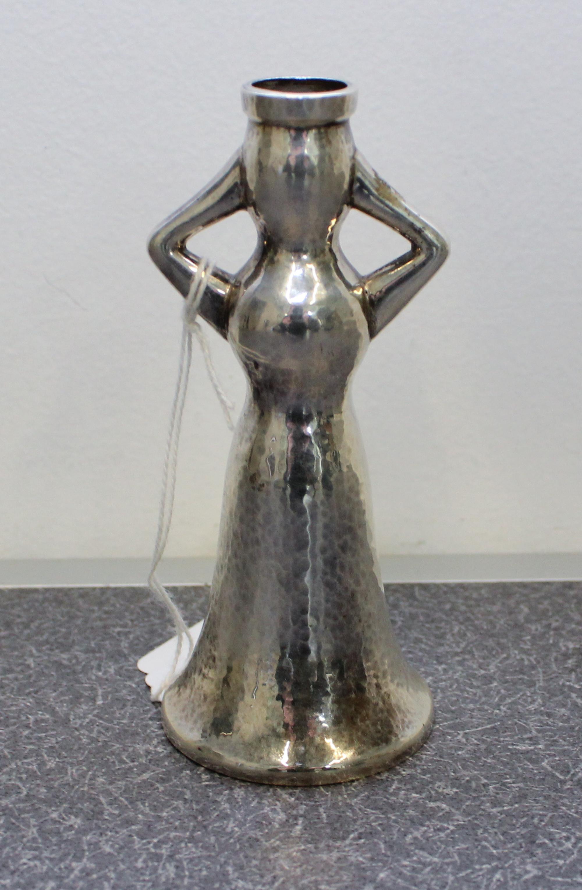 A Greek Silver Figural Candlestick Holder, Ilias Lalaounis, Athens, 20th Century, in the form of a female figure and worked with a spot