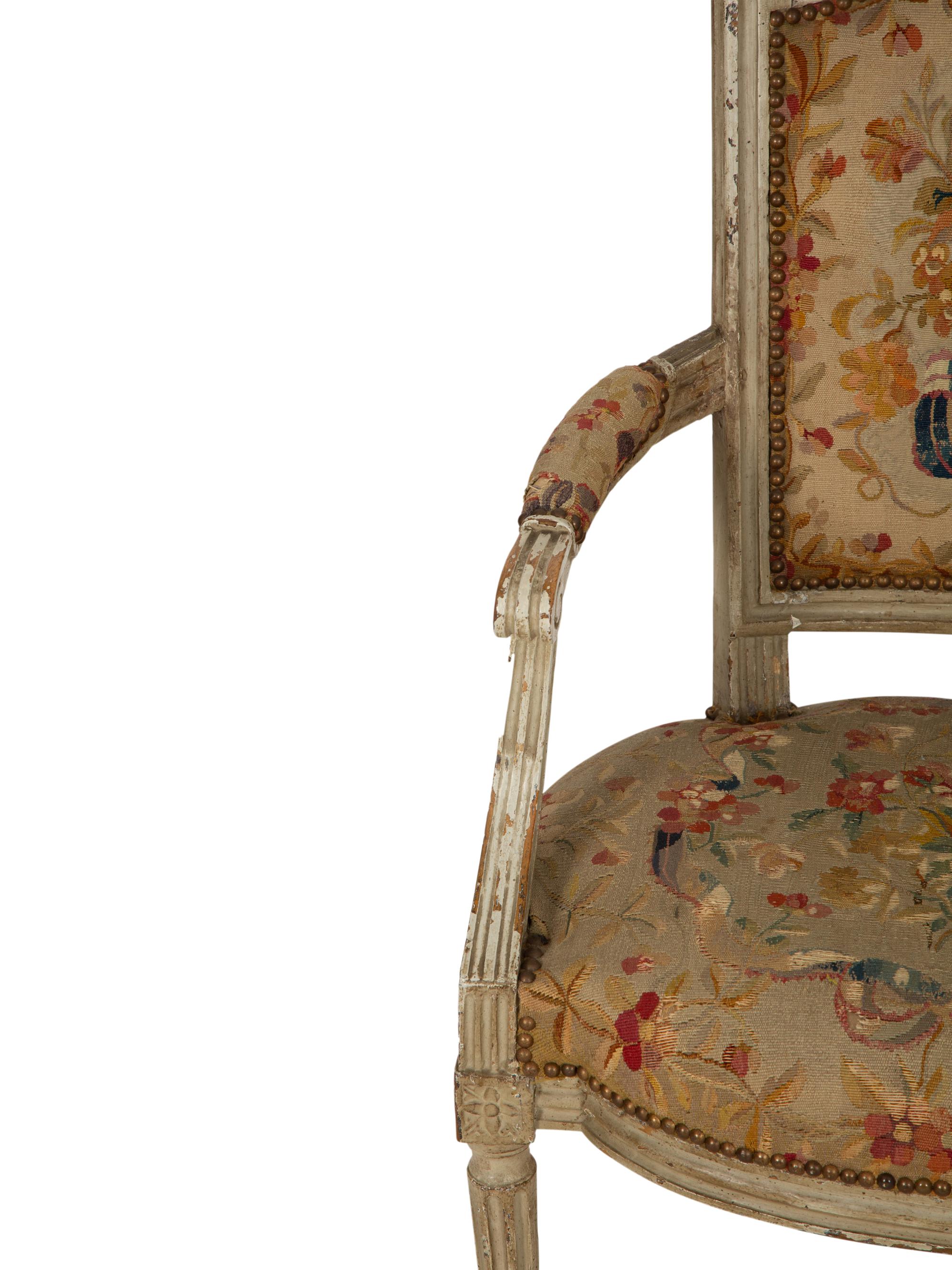 A Pair of Louis XVI Painted Fauteuils
