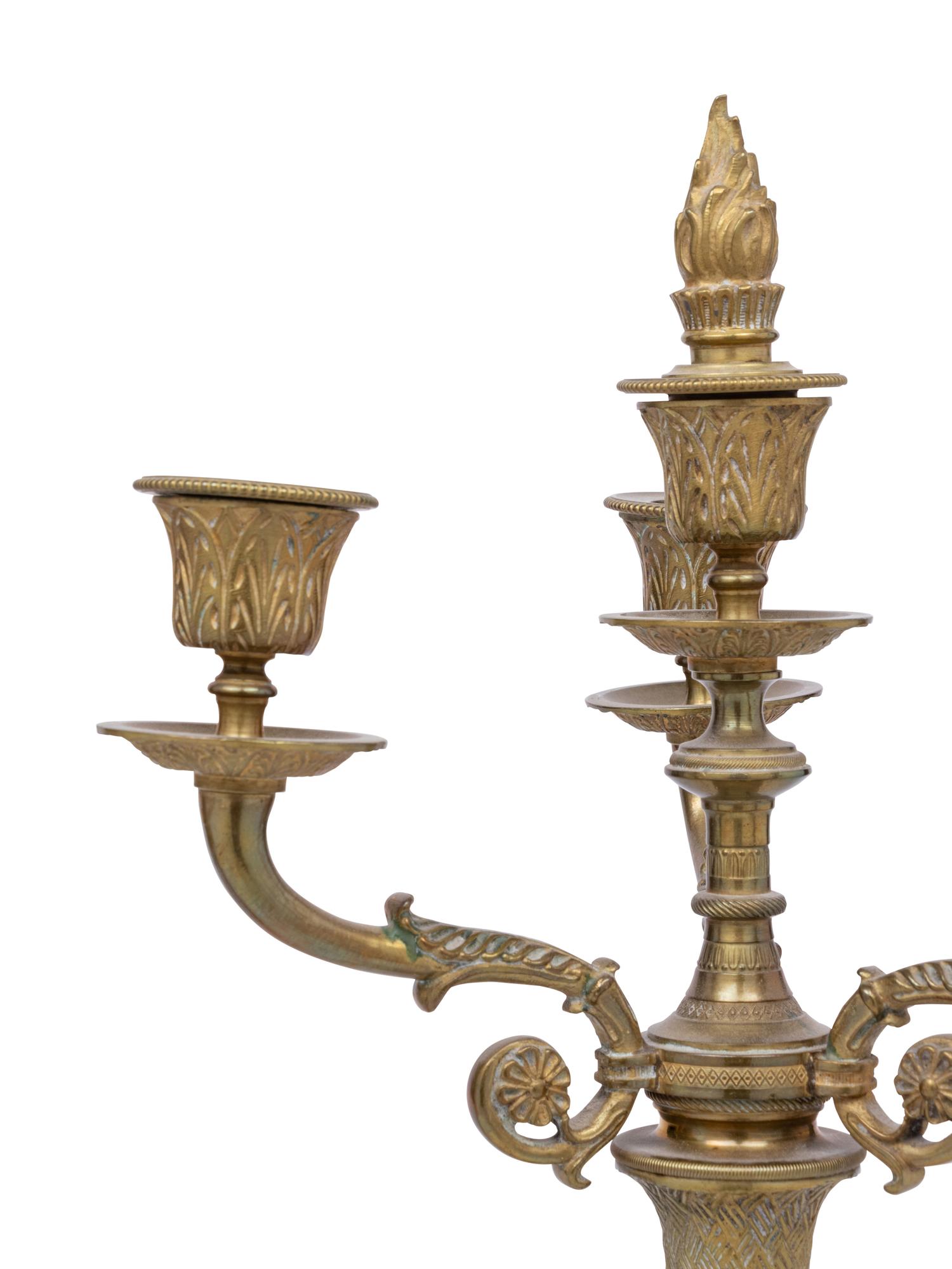 A Pair of Continental Gilt Bronze and Marble Three-Light Candelabra