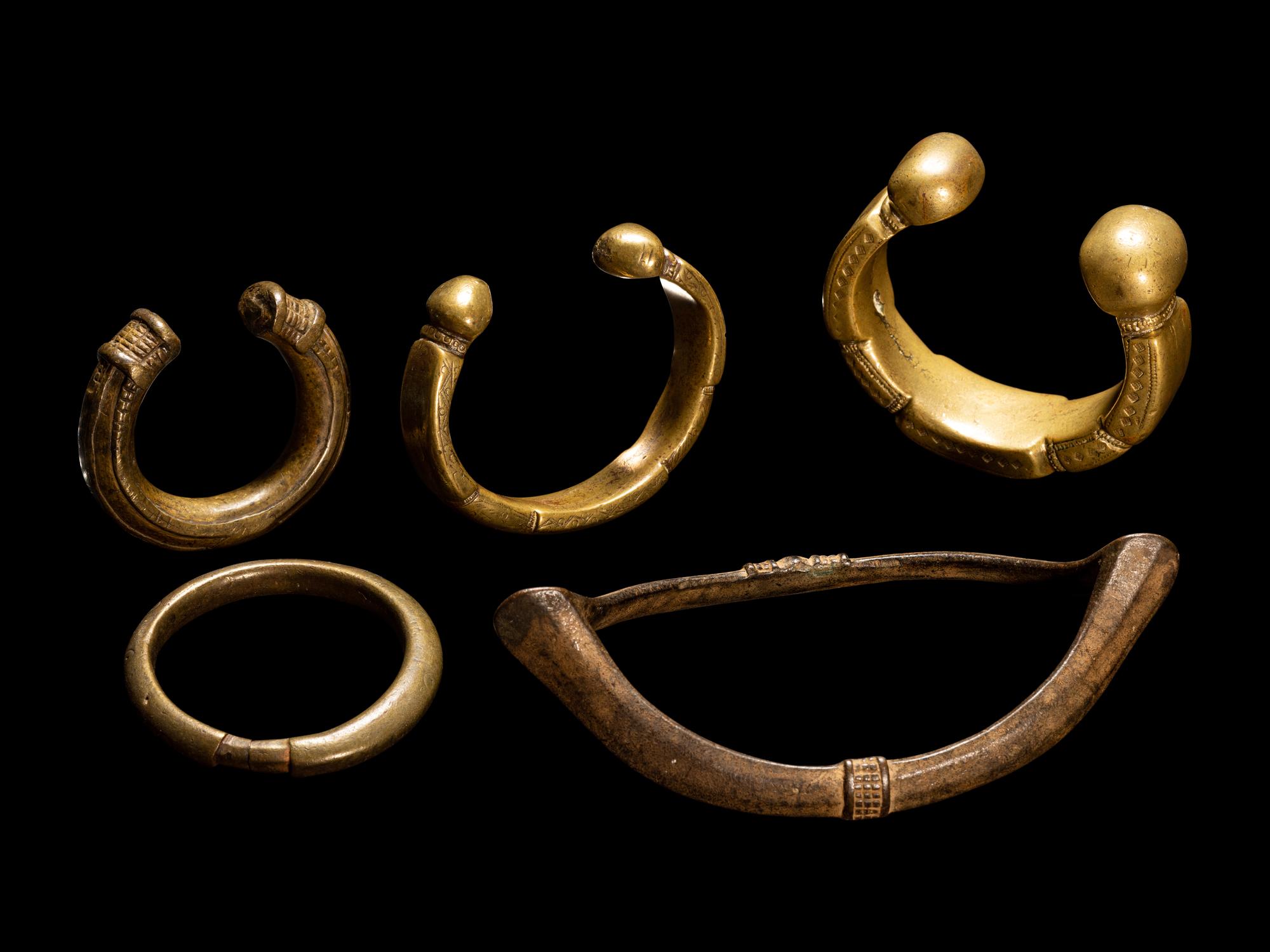 Five African Metalwork Currency Bracelets