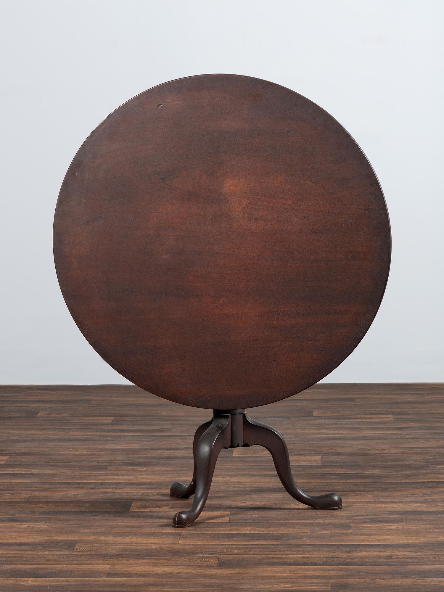 A Chippendale Turned Walnut Tilt-Tip Tea Table