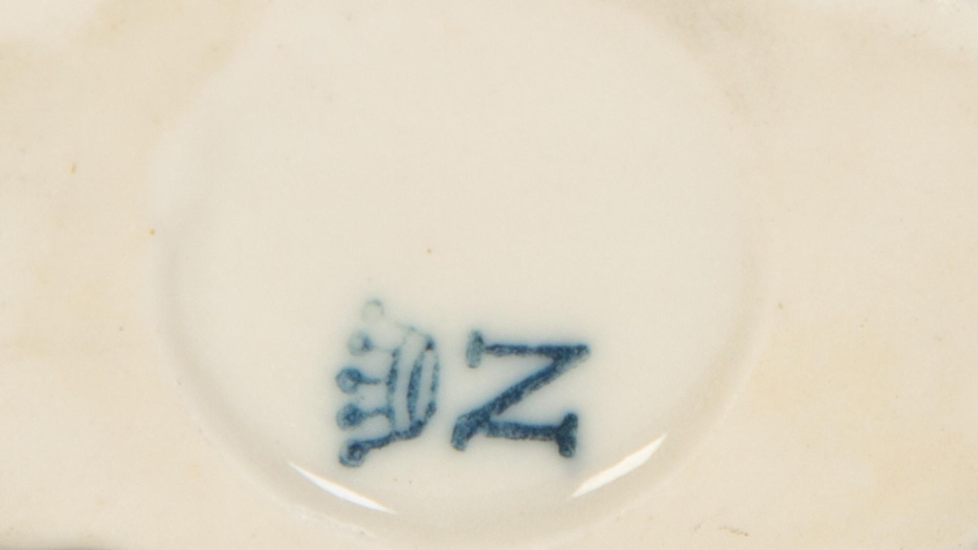 A Collection of Dresden Porcelain Place Cards, Holders and Napkin Rings