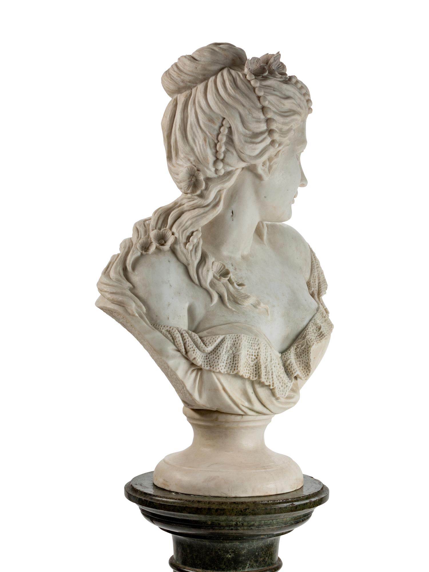 An Italian Carved Marble Bust of a Woman