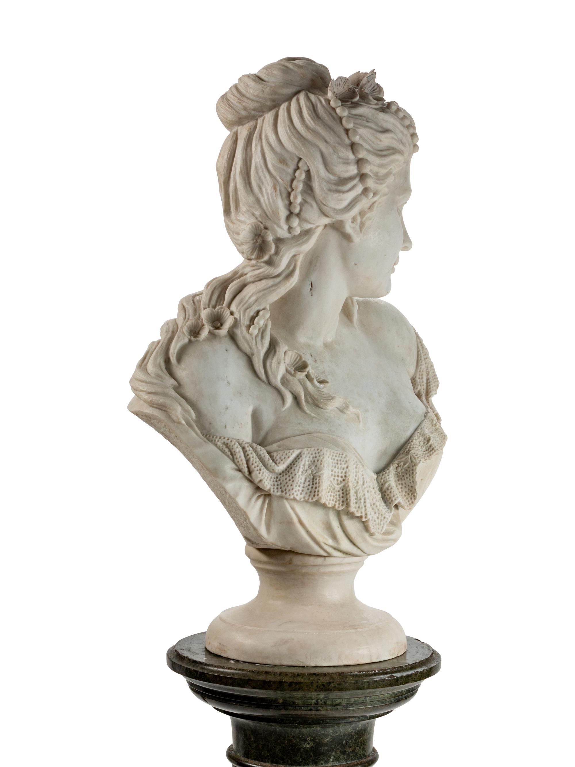 An Italian Carved Marble Bust of a Woman