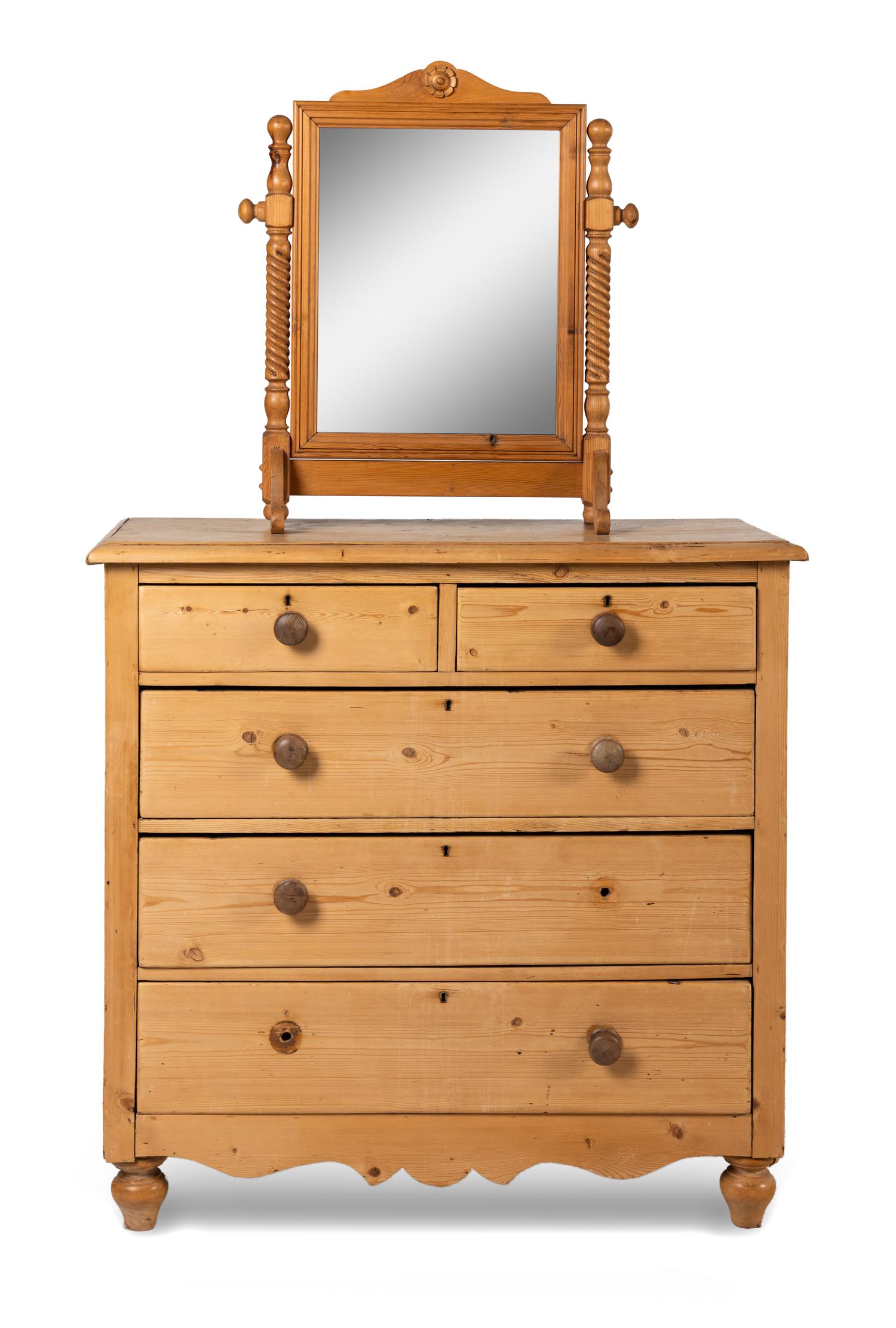 An English Pine Chest of Drawers and an Associated Dressing Mirror