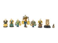 Eight Chinese Polychrome Enameled Pottery Figures