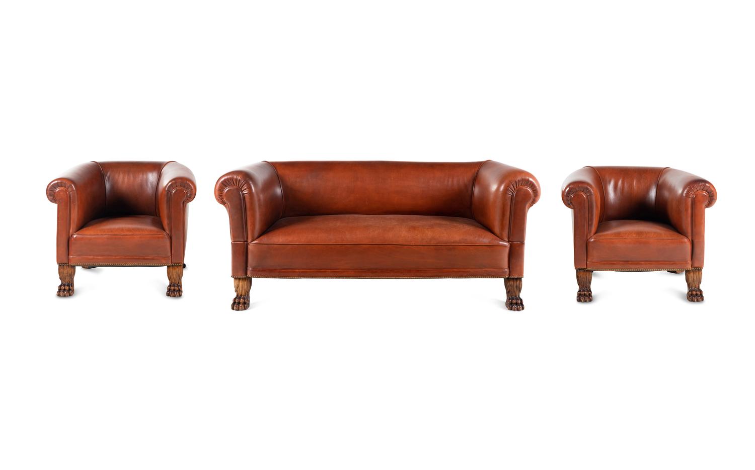 A Leather-Upholstered Mahogany Three-Piece Seating Suite