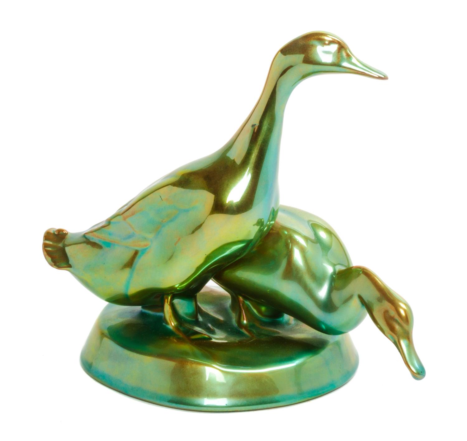 A Zsolnay Iridescent Glazed Figural Group Height 7 inches.