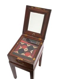 An English Brass-Inlaid Mahogany Game Box on Stand