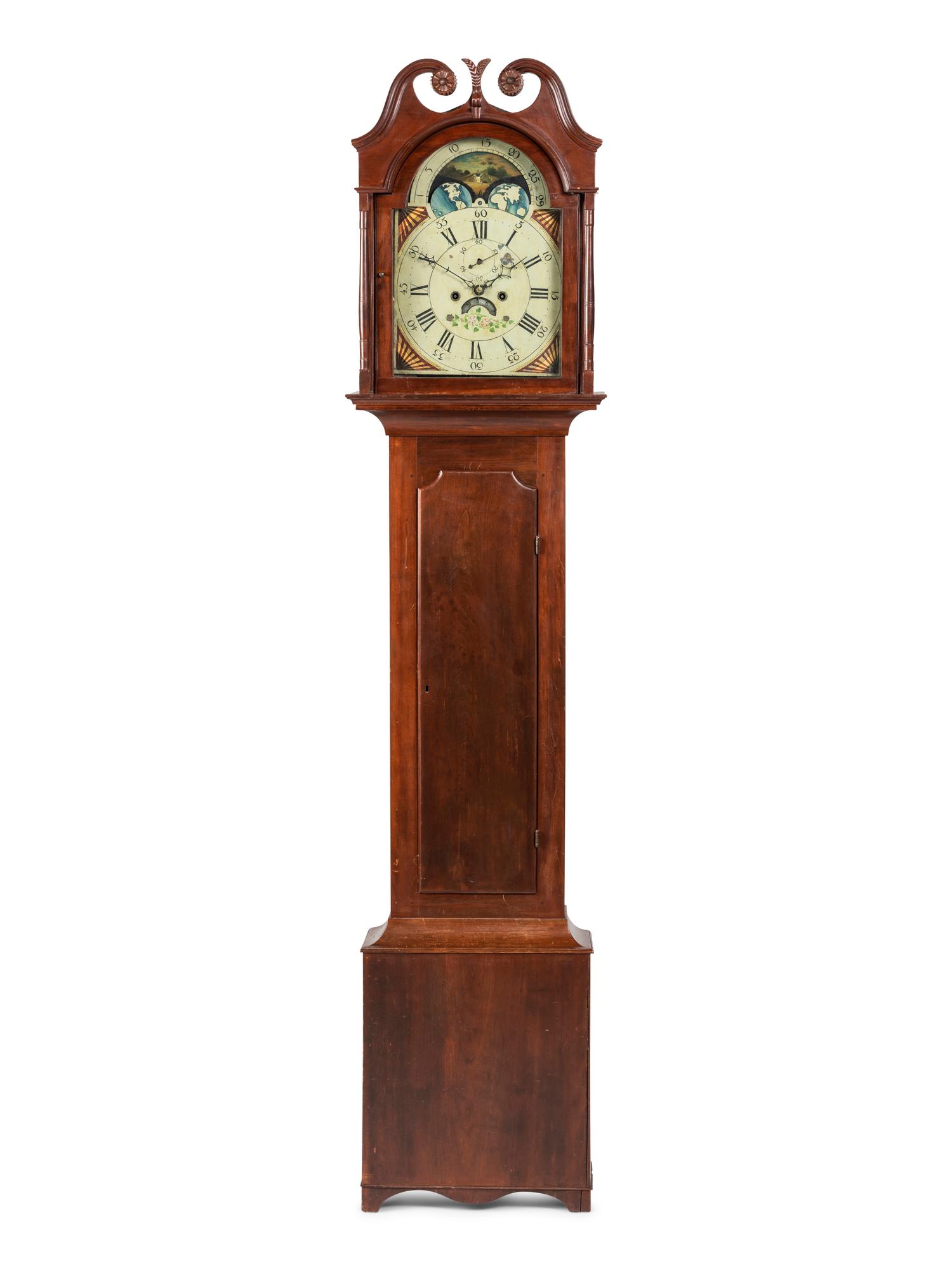 A Federal Carved Cherrywood Tall Case Clock