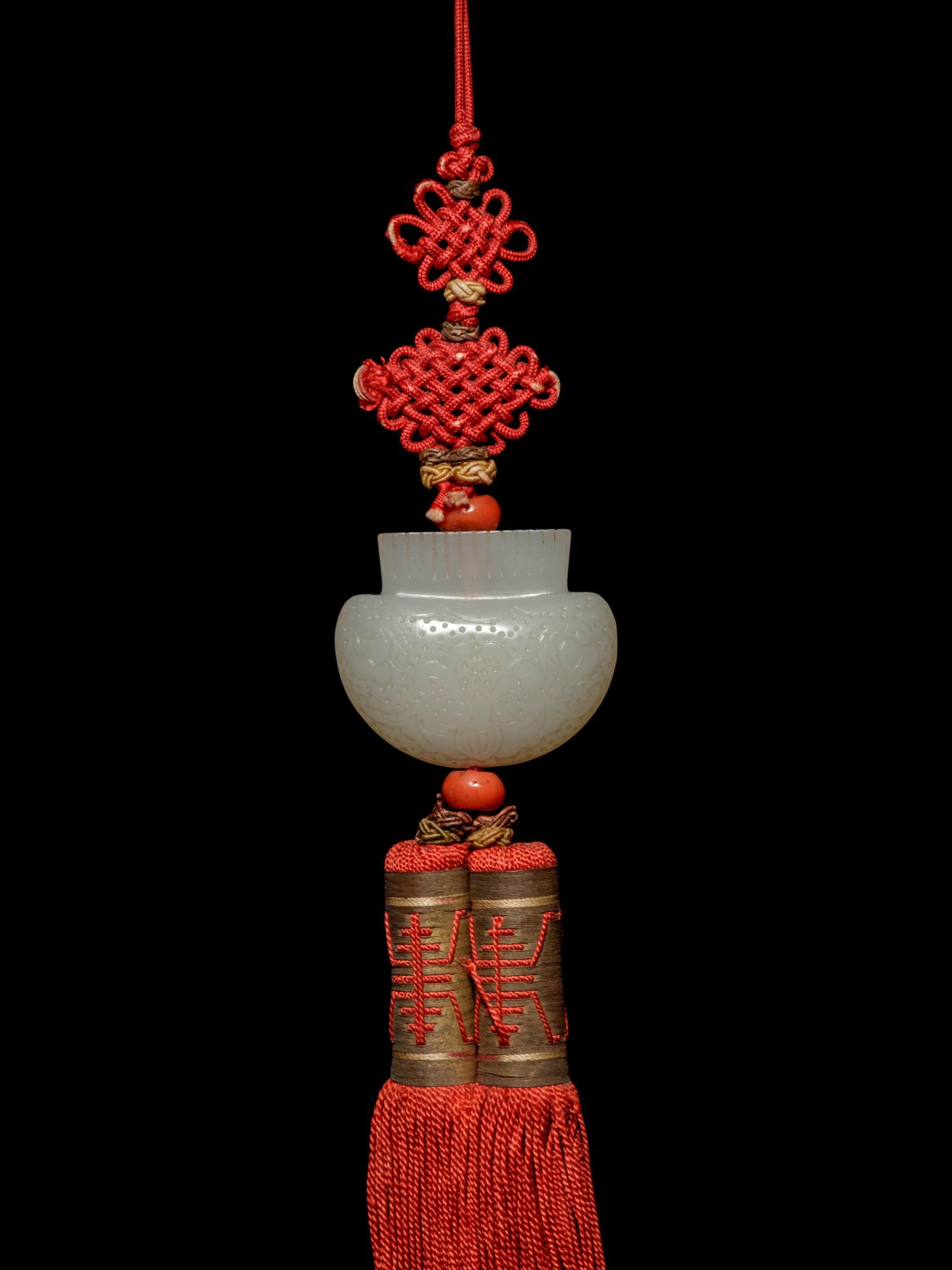 A White Jade Purse-Form Pendant