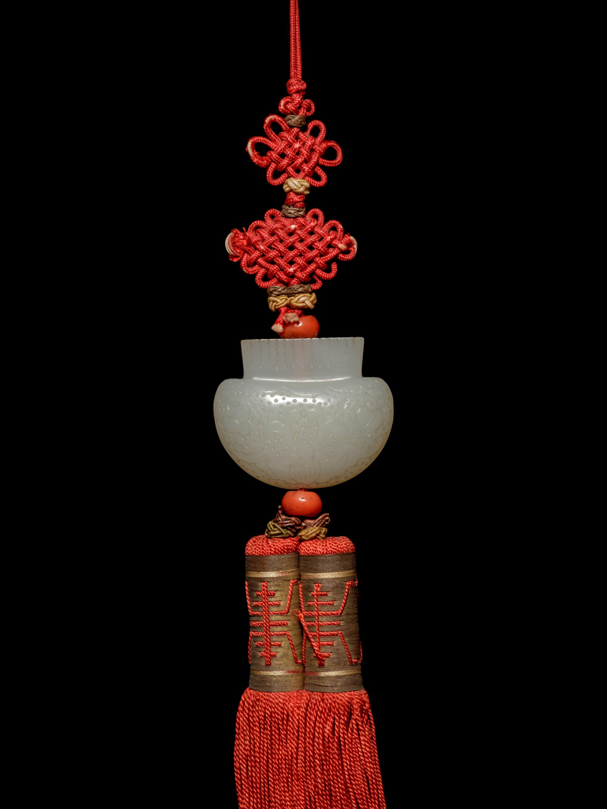 A White Jade Purse-Form Pendant