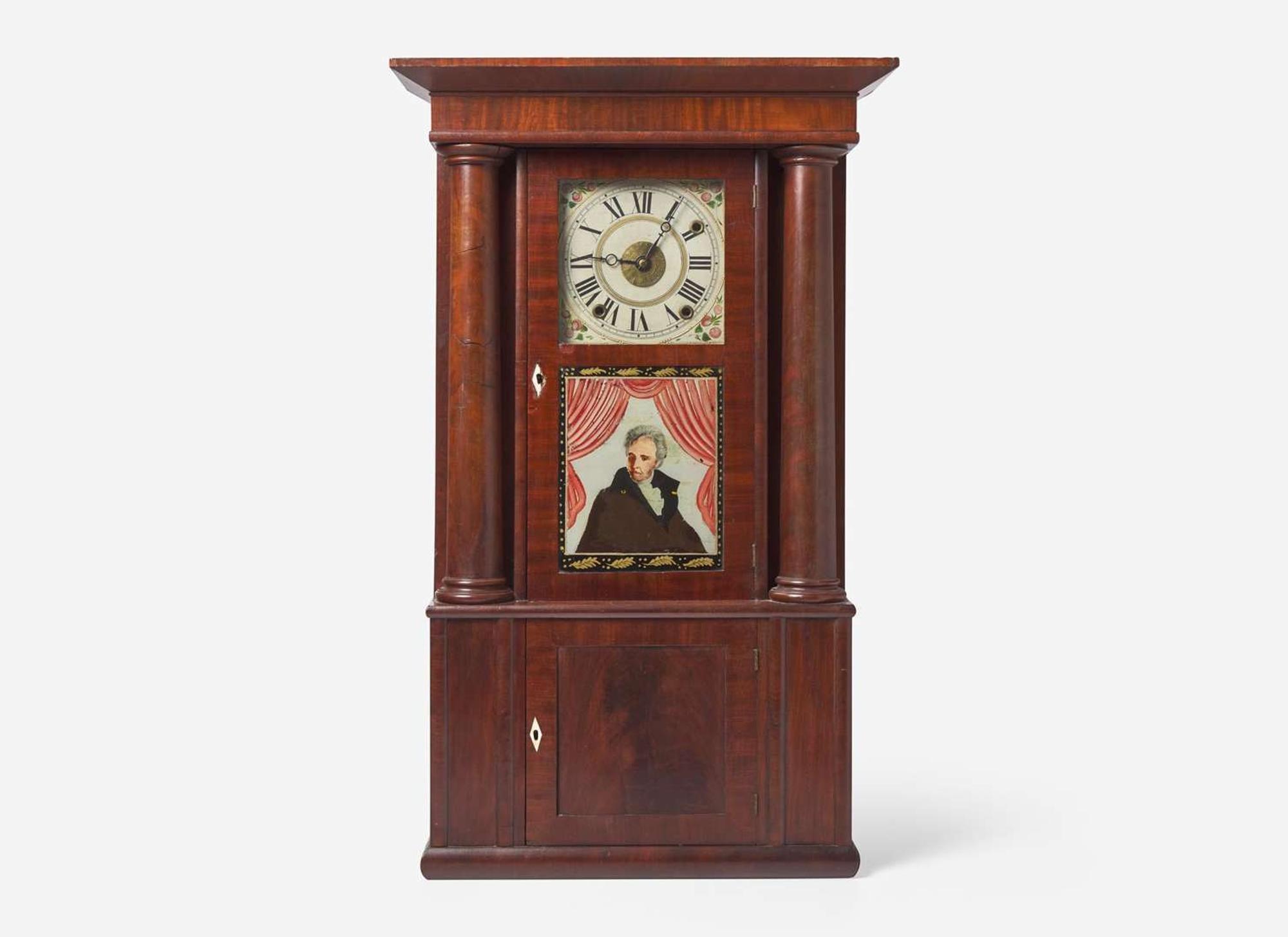 A Classical mahogany and mahogany veneer mantel clock with Andrew Jackson eglomise panel, bears printed paper label of Rodney Brace, North Bridgewater, MA, dated "1834"