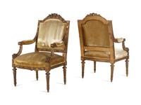 A Pair of Louis XVI Carved Giltwood Fauteuils