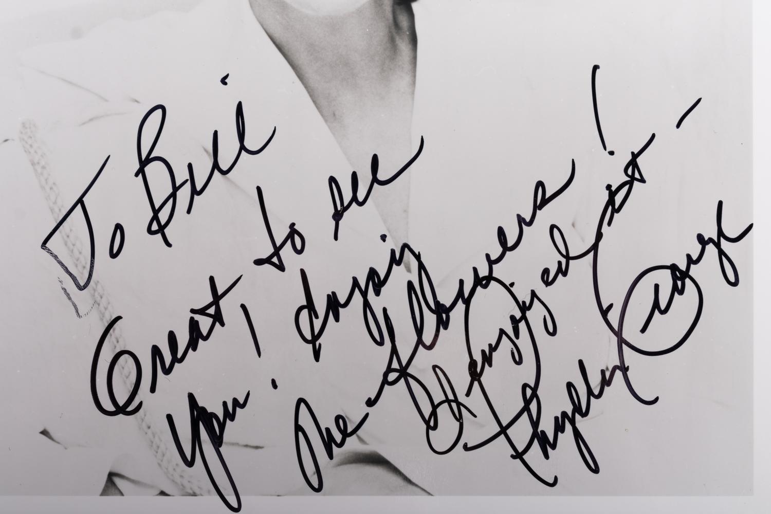 (Celebrity) A group of 20 autographed photographs of celebrities; comprising: