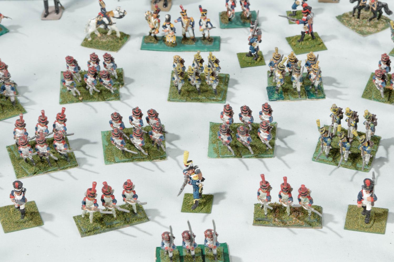 A Collection of Miniature Lead Soldiers in a Louis XV Style Vitrine Table