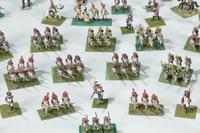 A Collection of Miniature Lead Soldiers in a Louis XV Style Vitrine Table