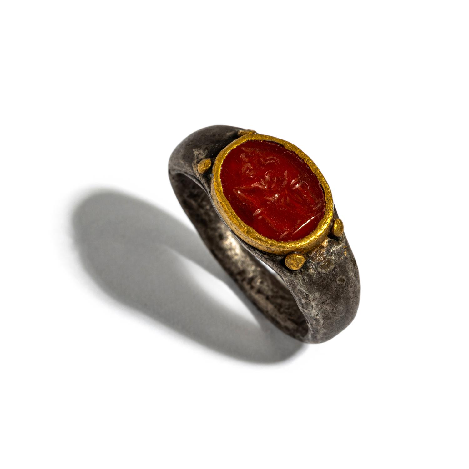 A Roman Gilt-Silver and Carnelian Finger Ring with the Goddess Minerva