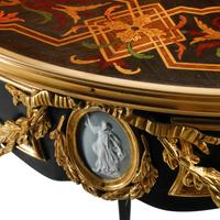 A Pair of Louis XV Style Gilt Bronze Mounted Marquetry Side Tables