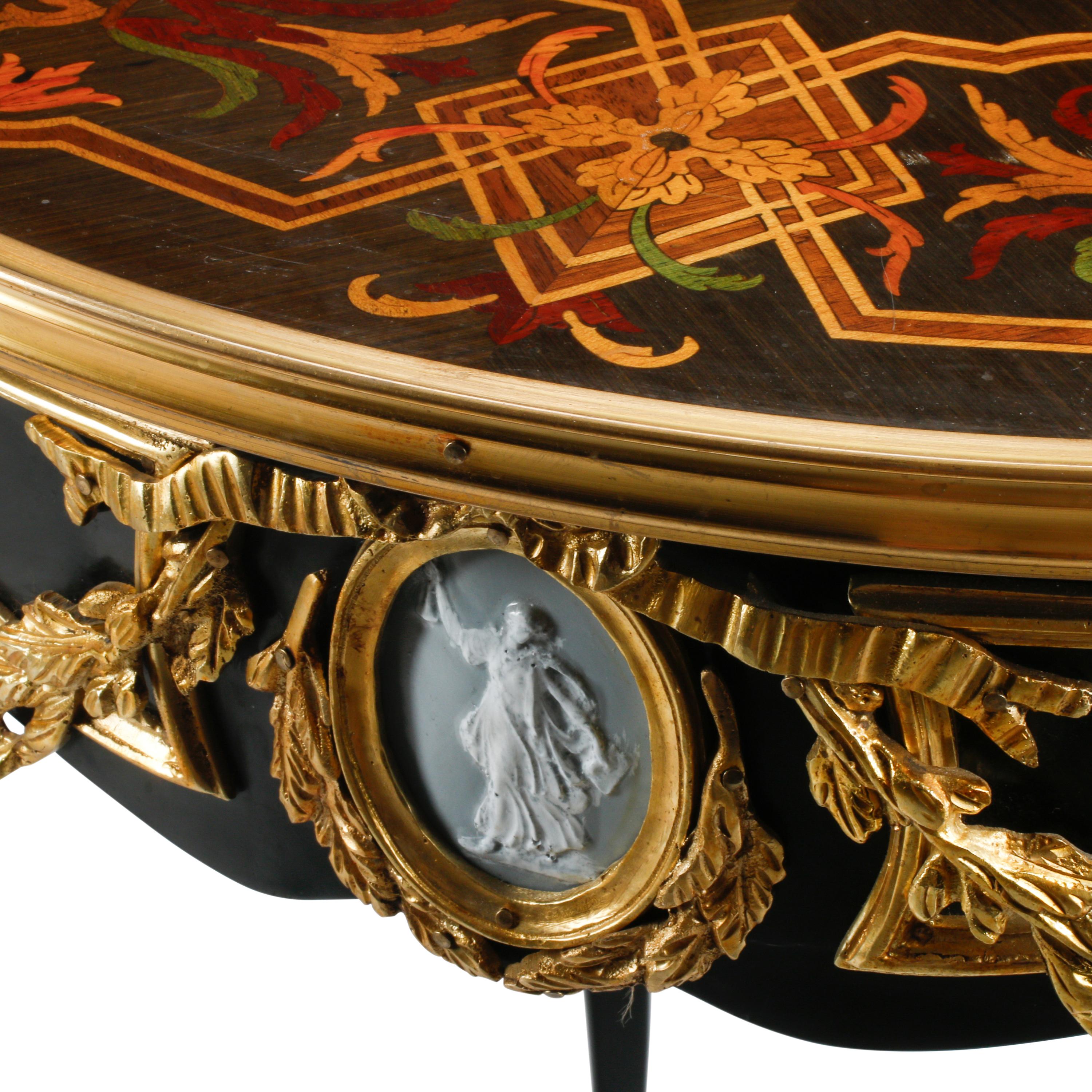 A Pair of Louis XV Style Gilt Bronze Mounted Marquetry Side Tables