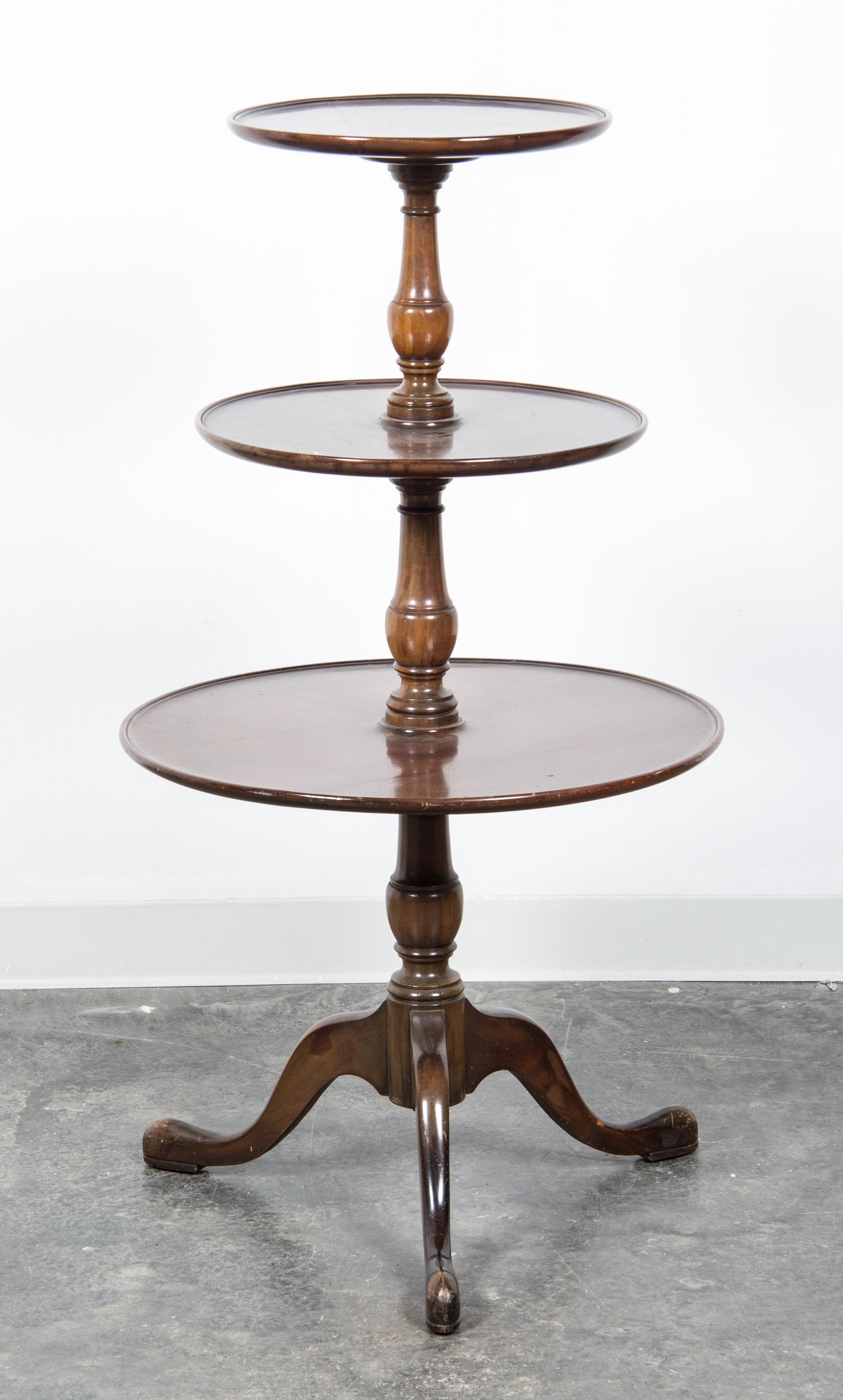 A George III Mahogany Dumbwaiter Height 43 inches. — 19TH CENTURY