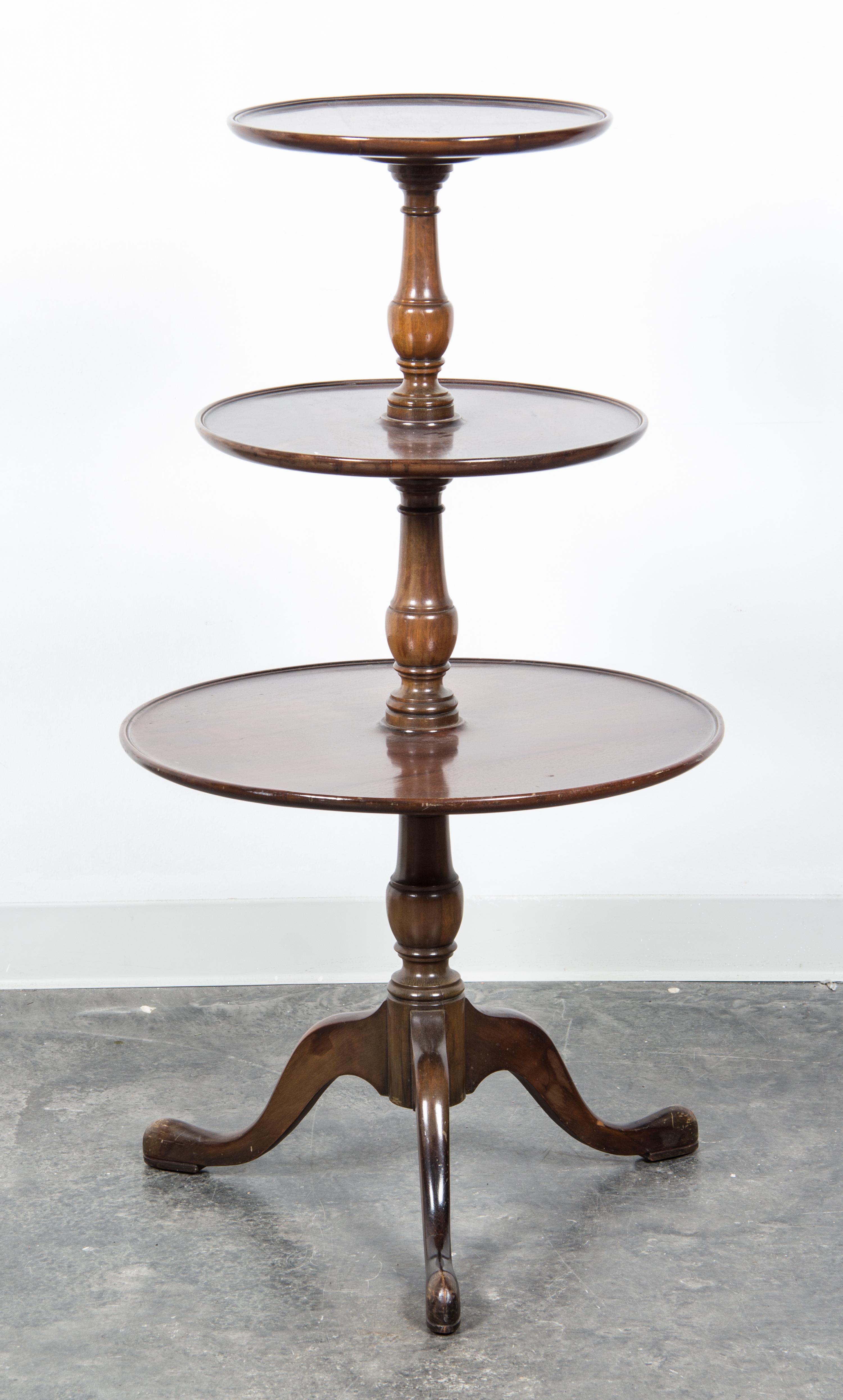 A George III Mahogany Dumbwaiter Height 43 inches. — 19TH CENTURY