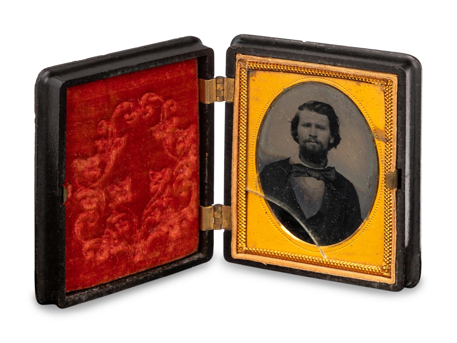 A Group of Four Tintypes of Men and a Woman