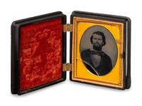 A Group of Four Tintypes of Men and a Woman