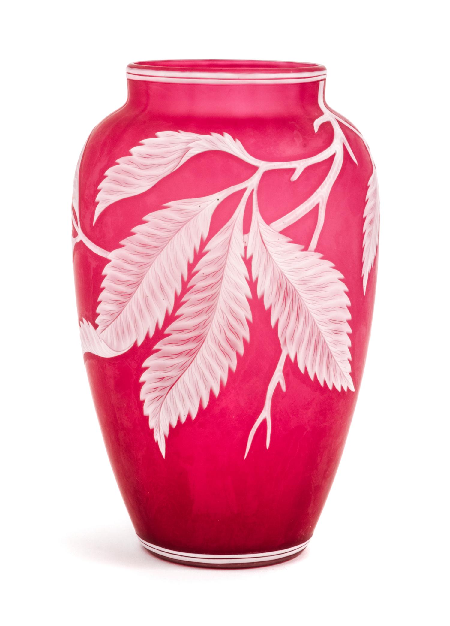 English, LATE 19TH CENTURY, a cameo glass vase, of elongated ovoid form with berry laden leafy branch decoration