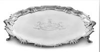 A George II Silver Salver, William Preston, London, 1752, engraved at the center with a coat of arms having a peacock crest and cheetah