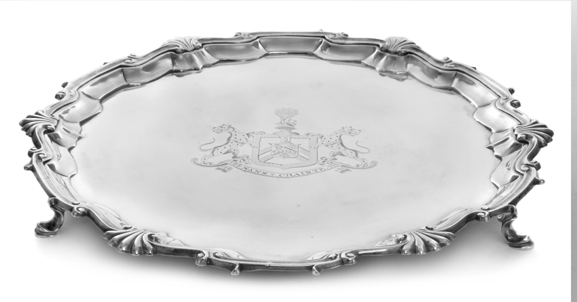 A George II Silver Salver, William Preston, London, 1752, engraved at the center with a coat of arms having a peacock crest and cheetah