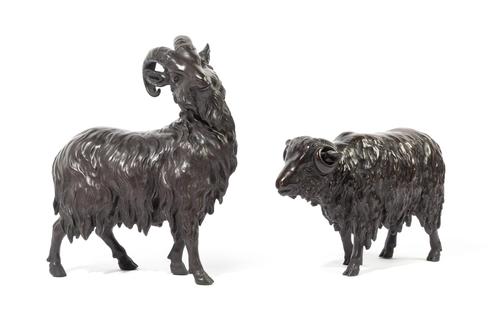 A Pair of Japanese Bronze Rams SIGNED ATSU YOSHI, LATE 19TH CENTURY, MEIJI PERIOD Height of tallest 11 3/4 inches. — SIGNED ATSU YOSHI, LATE 19TH CENTURY, MEIJI PERIOD