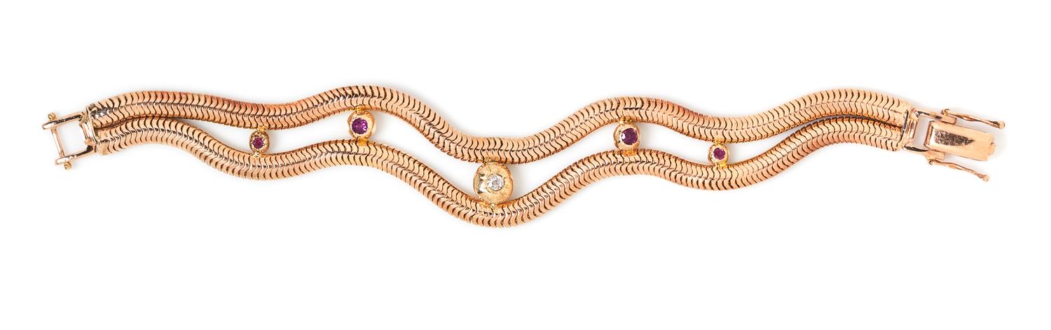 A Retro Rose Gold, Diamond and Ruby Bracelet, 28.10 dwts.